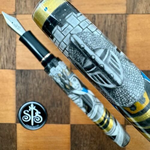 Fountain pen cap showing a knight with visor and chainmail